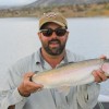 Angler With Rainbow Trout