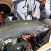 Angler Holding Rainbow Trout